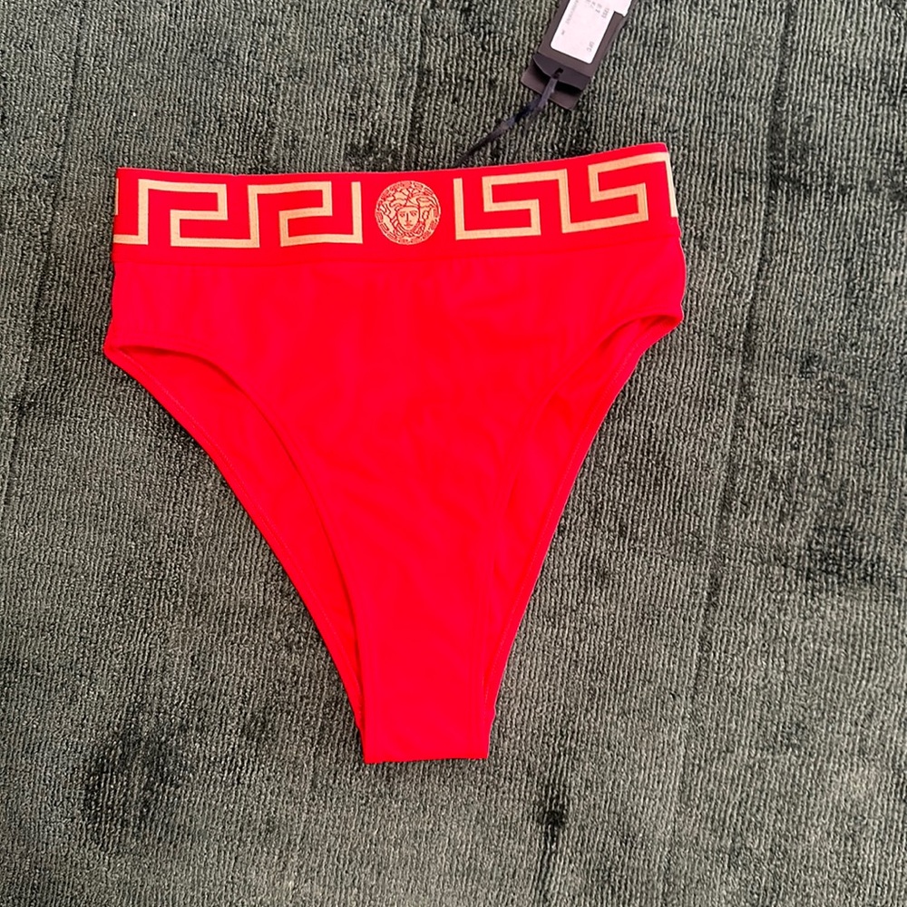 Never worn Versace bottoms. Size 2 (runs small) so if you are a 0 perfect!